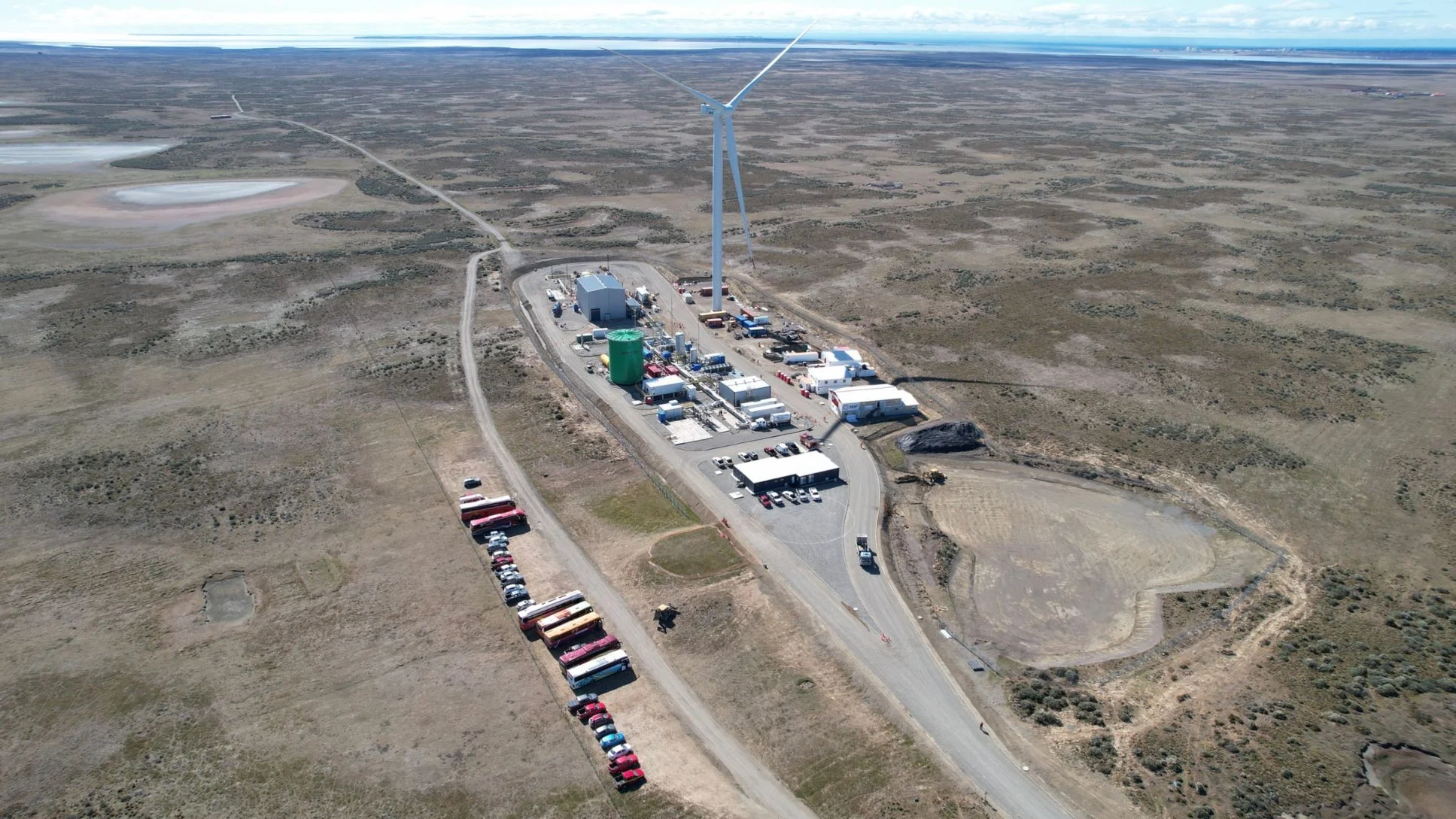 Aerial view of the Haru Oni pilot e-fuel facility and its wind turbine near Punta Arenas in Chile
